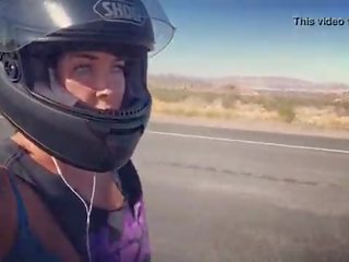 Felicity feline motorcycle femme fatale राइडिंग aprilia में ब्रा