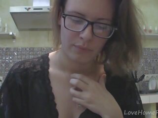 Solo lover with glasses chatting in the kitchen