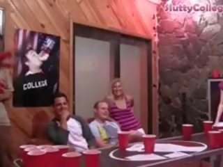 Group Of College Girls Playing Beerpong With lascivious blokes
