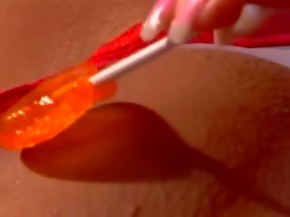 Desiring blonde Audrianna Angel rubs her sticky slot with a lolliop and fucks dick